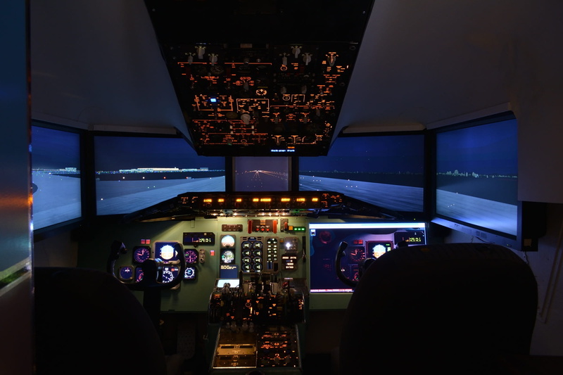 film industry, airport, aerospace industry, men, flight simulator, computer, glass - material, mode of transportation, airplane, flight, control, night