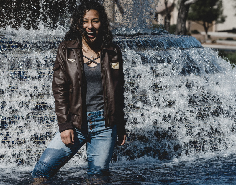woman, hair, scarf, looking, beauty, water, clothing, fountain, wear, jeans, casual clothing, warm clothing, standing, outerwear, 4K, young adult, smiling