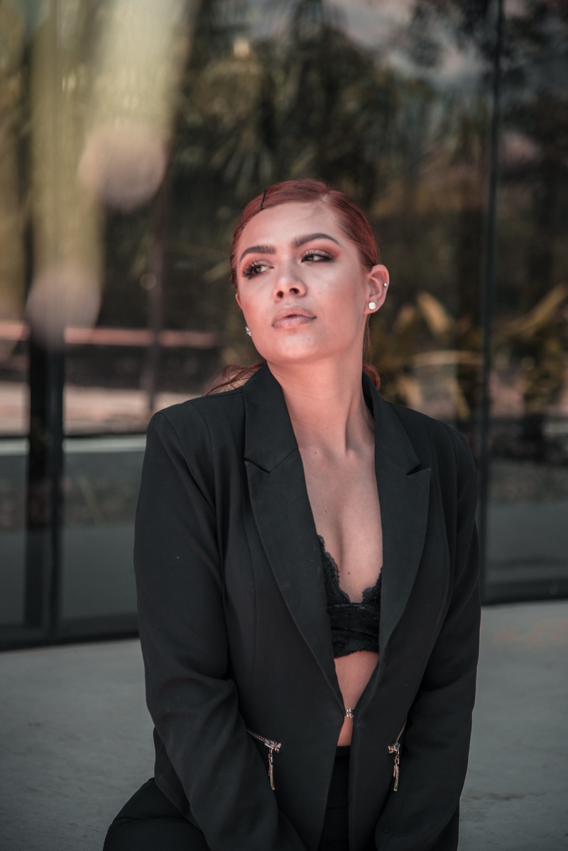 focus on foreground, wearing, real people, adult, standing, contemplation, one person, woman, peak, outfit, young women, daylight, outerwear, beautiful woman