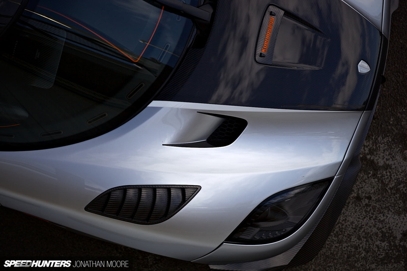 reflection, day, stationary, airplane, Super Car , motor vehicle, vehicle, land vehicle, white, mode of transportation, outdoors, honda, car, suv, silver cars