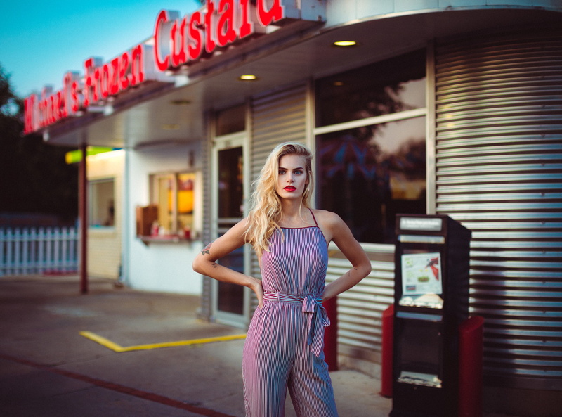 Robert Stebler, young adult, front view, hairstyle, building exterior, three quarter length, overalls, architecture, hair, standing, beautiful woman, one person
