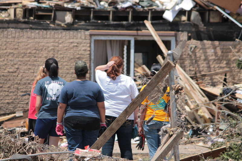 destruction, shock, outdoors, unknown, ruin, oklahoma, working, five, dismay, full length, emotion, real people, built structure, rear view, wood - material