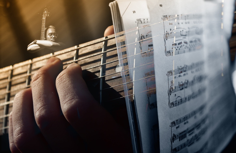 play, human hand, emotion, show, plucking an instrument, finger, hand, close-up, photo, closeup, holding, occurs, playing, string instrument, indoors, human body part