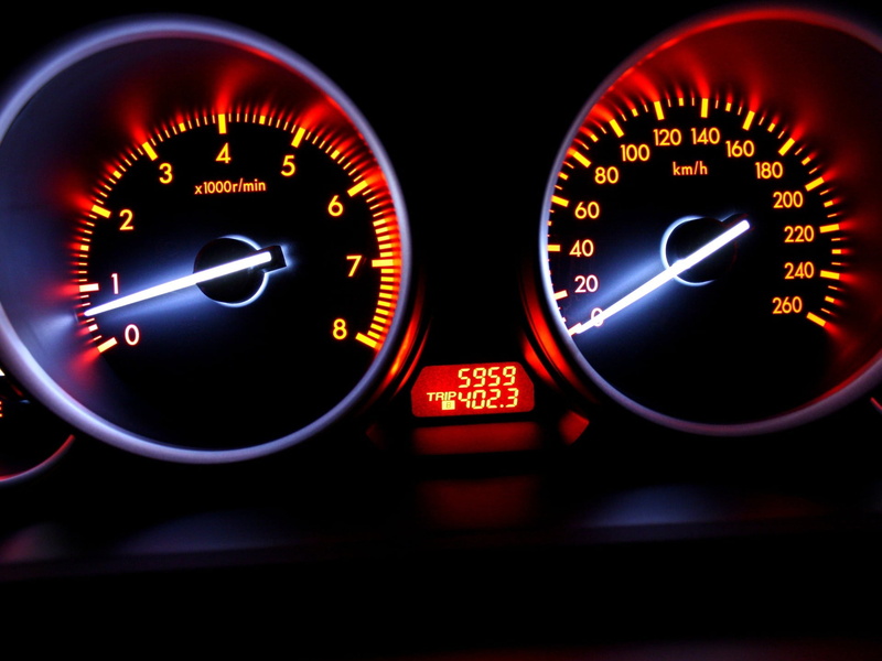 car interior, driving, gauge, speed, close-up, vehicle, vehicle Interior, engine, transportation, dark, blur, bright colors, fuel Gauge, number, mode of transportation