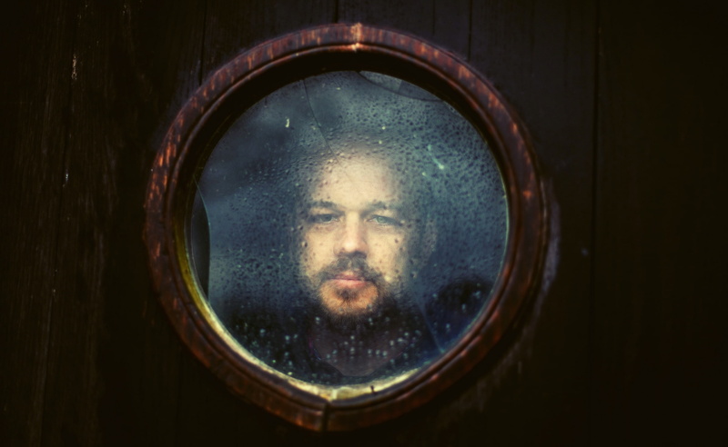 headshot, circle, males, geometric shape, mirror, hole, close-up, Window, one person, reflection, Shoot, new york city, 2K, deep, Pane, run, Glass, men