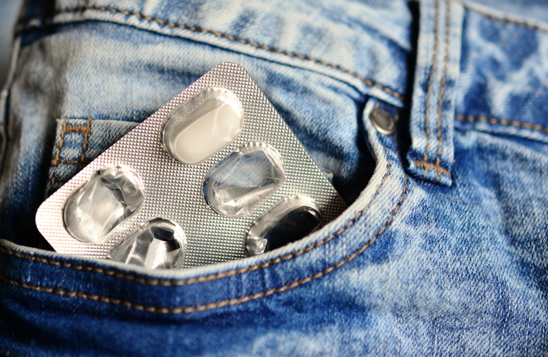 close-up, textile, no people, 5K, tablets, pocket, textured, addiction, pack, left, one, medicinal products, dose, drugs of abuse, caplet, inside, midsection
