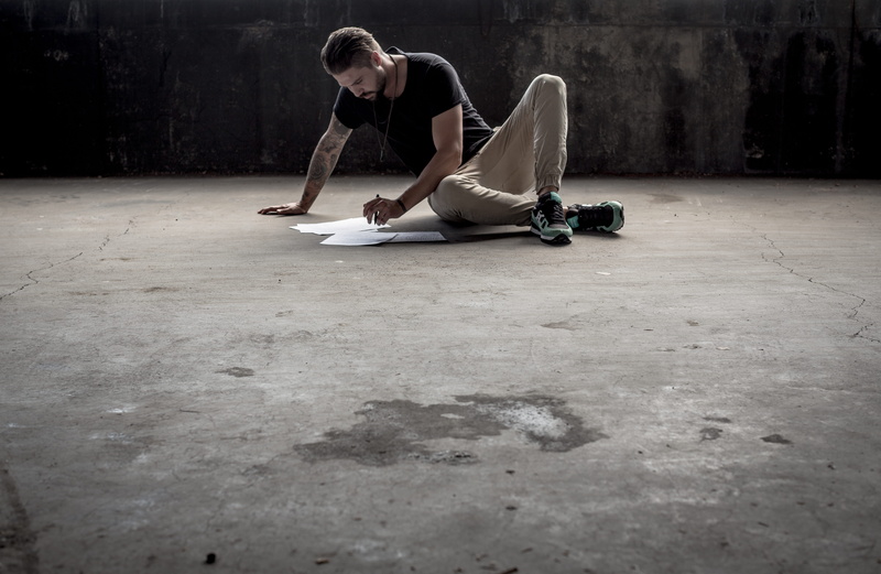 making, flooring, day, real people, full length, alone, casual clothing, balance, athlete, letter, adult, young adult, young men, one person, surface level