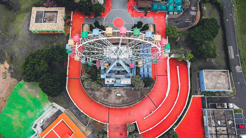 photography, sphere, outdoors, ferris wheel, red, no people, high angle view, tree, communication, leisure activities, shape, aerial view, creativity, daytime