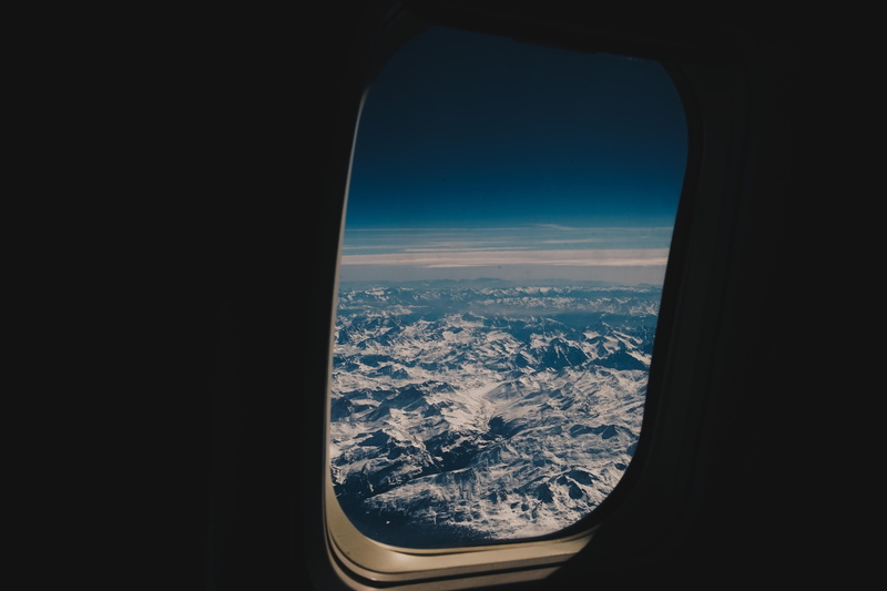 commercial Airplane, mode of transportation, air Vehicle, glass - material, landscape, window, beauty in nature, winter, sky, transparent, porthole, snow