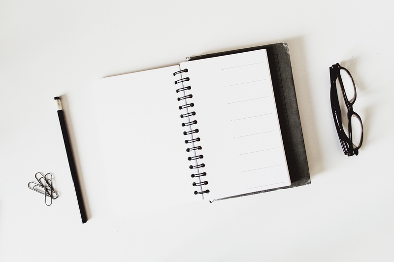 studio shot, white color, indoors, white, glasses, spiral notebook, sunglasses, pencil, no people, pen, topdown, notebook, high angle view, minimal desk