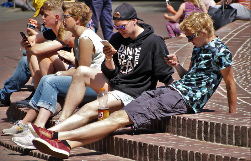 wearing, happy, cellphone, friends, black, smartphone, lifestyles, men, day, lifestyle, kid, teal, mobile, young adult, 1080P, pokemon, young women, sitting