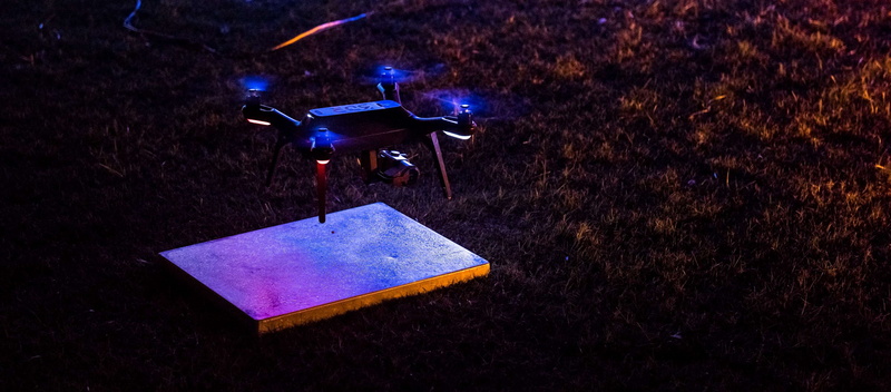 no people, outdoors, high angle view, solo drone, land, nature, night, plant, glowing, still life, lighting equipment, solo 3dr, drone cam, illuminated