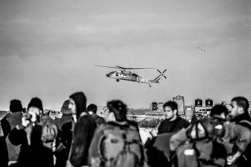 large group of people, men, sky, 2K, bandw, chopper, women, togetherness, nature, wireless technology, real people, lifestyles, day, adult, military, flying
