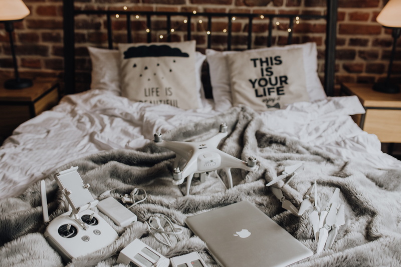 computer, dji, technology, macbook, indoors, furniture, laptop, home interior, linen, accessories, clothing, focus on foreground, ready, dress, macbook pro