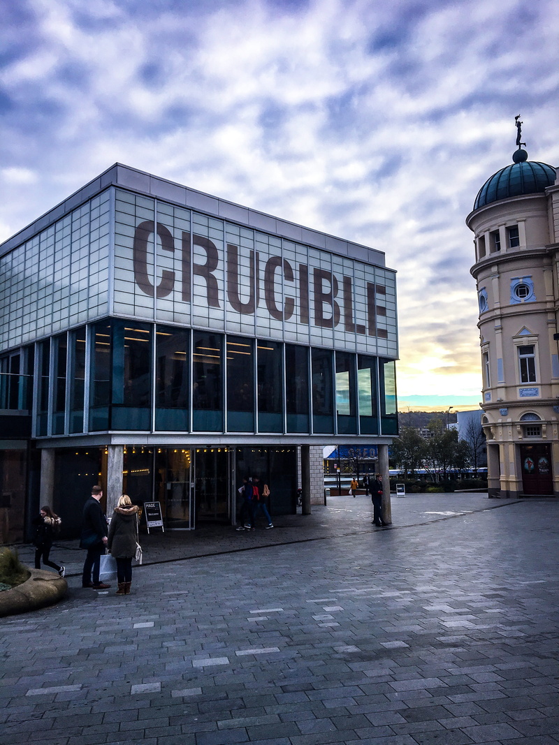 building exterior, men, cloud - sky, nature, architecture, built structure, daytime, street, communication, day, sky, outdoors, signage, crucible, people
