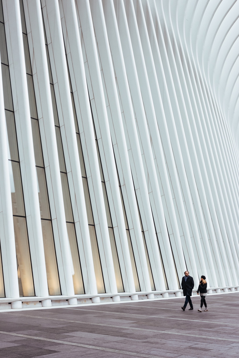 architectural column, real people, front, candid, architecture, minimalist, building exterior, new york, women, city life, adult, walking, person, people