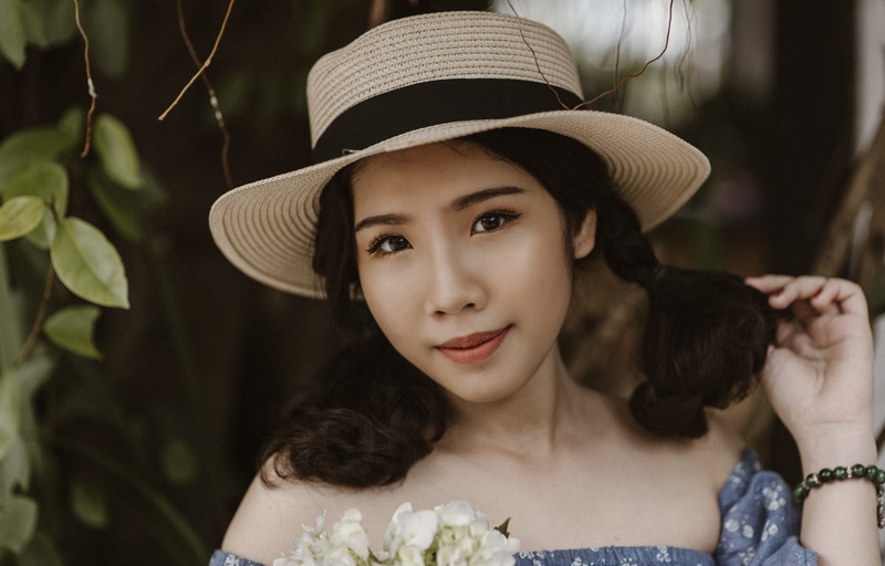 hand, teenager, blur, vine, females, portrait, woman, lips, face, photography, hairstyle, leaves, childhood, one person, hair, plant, dress, beautiful people