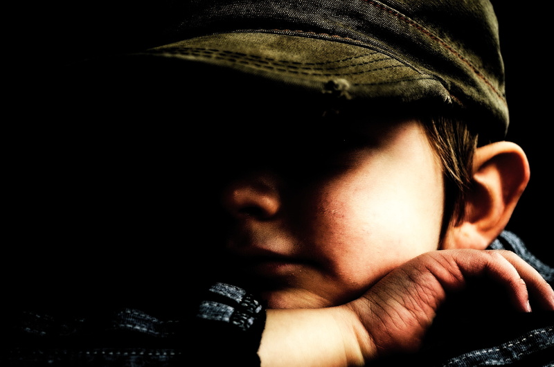 human body part, headshot, view, Child, depression - sadness, mood, cap, dark, curve, close-up, brown, caps, shadow, People, men, one person, boy, lifestyles