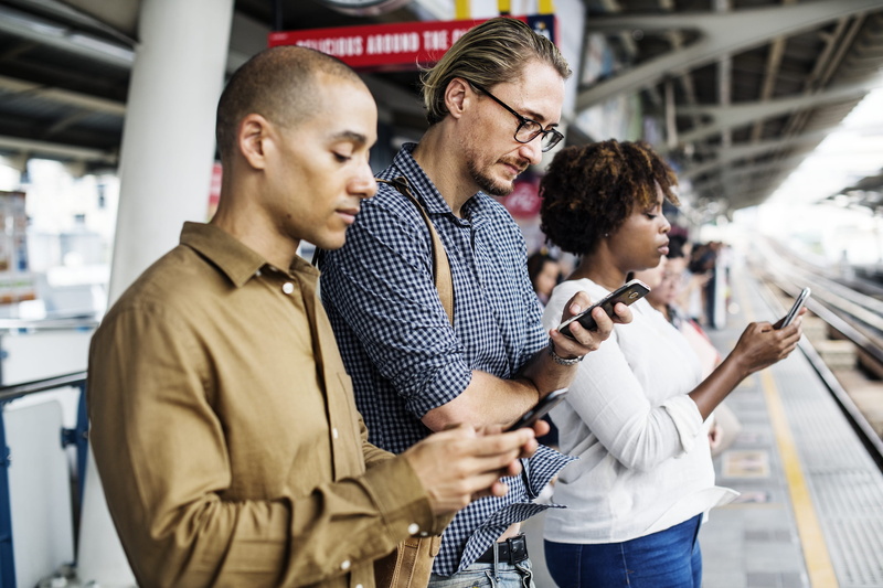 innovation, waist up, online, electronic, focus on foreground, commerce, railroad station, internet, connection, data, shopping, network, wear, information
