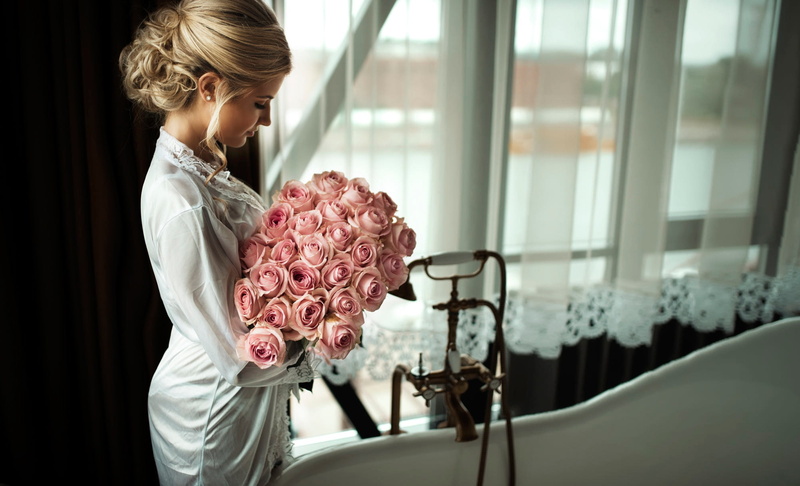 real people, adult, fashion, blond hair, lifestyles, earring, one person, flower head, beautiful woman, bathroom, rose, see-through clothing, lace, flowers