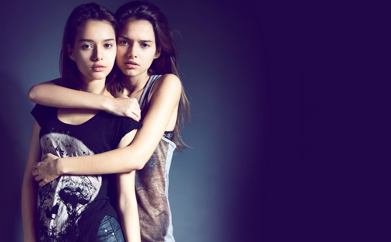 positive emotion, females, love, studio shot, two people, young adult, couple - relationship, fashion, young women, looking at camera, beautiful woman