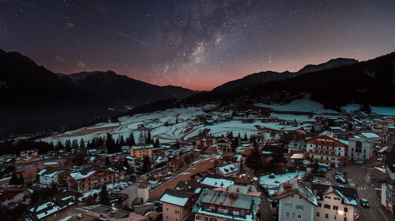 outdoors, sunset, village, cold temperature, townscape, snowcapped mountain, view, night sky, beauty in nature, astronomy, mountain peak, above, landscape