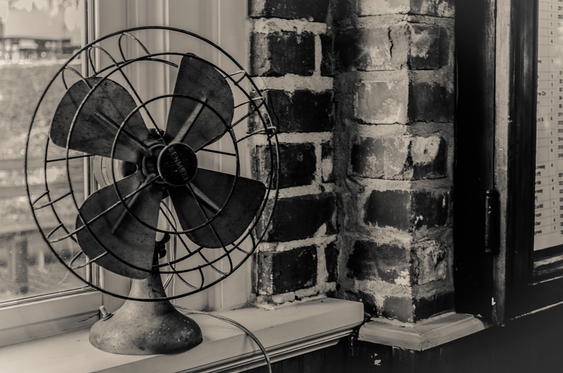 indoors, history, the past, old, exhaust fan, architecture, wall - building feature, no people, vintage, metal, built structure, brick wall, clock, obsolete