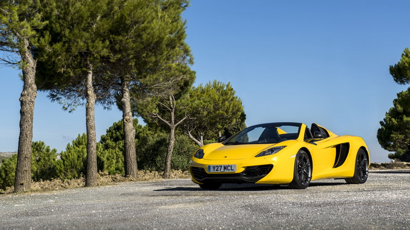 McLaren, sunlight, sky, day, yellow, blue, transportation, green color, mode of transportation, land vehicle, plant, growth, clear sky, car, taxi, motor vehicle