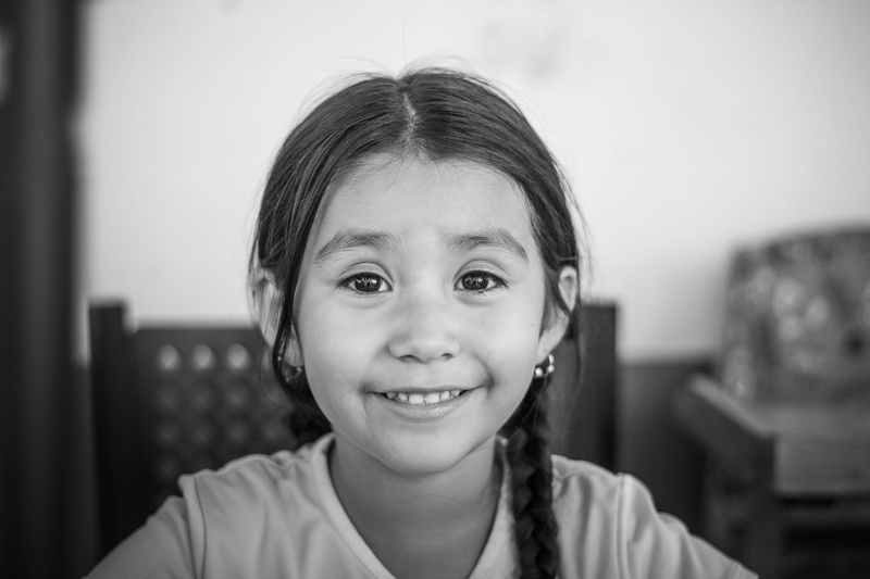 offspring, People, females, Moments, innocence, headshot, looking at camera, focus on foreground, teeth, indoors, 5K, front view, finger, Black and White
