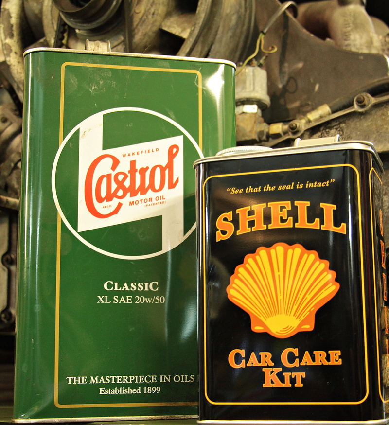 warning sign, oil cans, deco, full frame, retail, oil, auto repair, communication, western script, motor oil cans, no people, engine block, castrol, sign