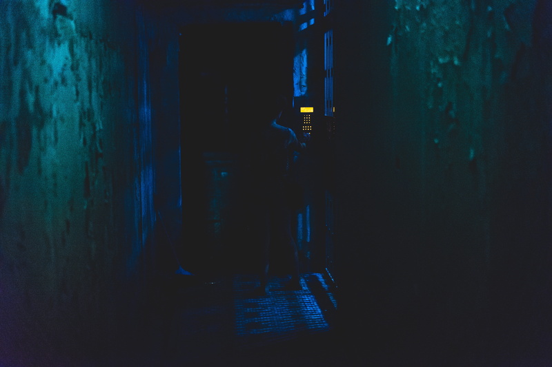 adult, spooky, security, indoors, entrance, entry code, real people, blue, dark, alley way, architecture, untitled, key code, door, one person, technology