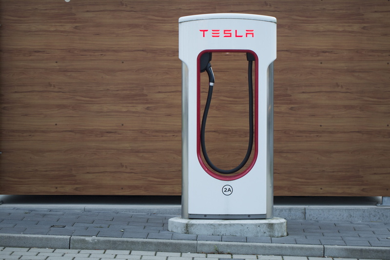 day, door, information, building exterior, brown, white, wood - material, petrol stations, e-mobile, text, electric car, script, current, automotive industry