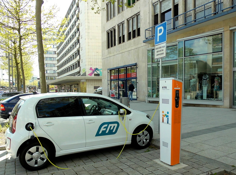 city, street, car, clean transport, mode of transportation, environmentally friendly, charging station, city life, white, sign, door, building exterior