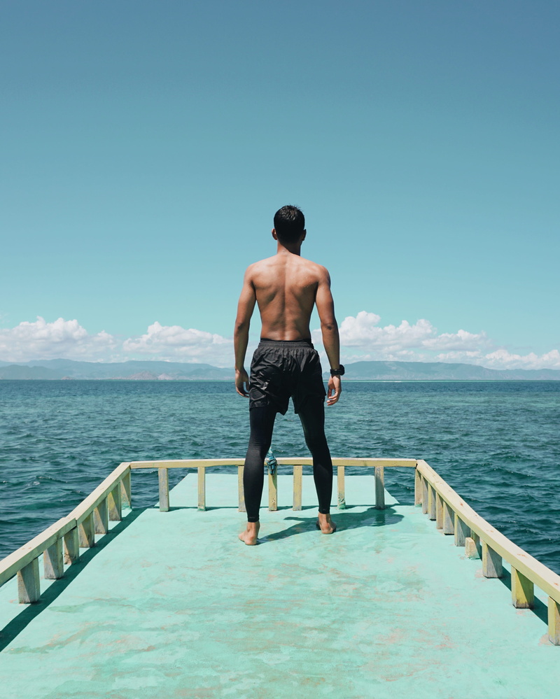 real people, apparel, banister, people, sea, skin, human, porch, sky, railing, back, deck, man, lifestyles, full length, 4K, young adult, horizon over water