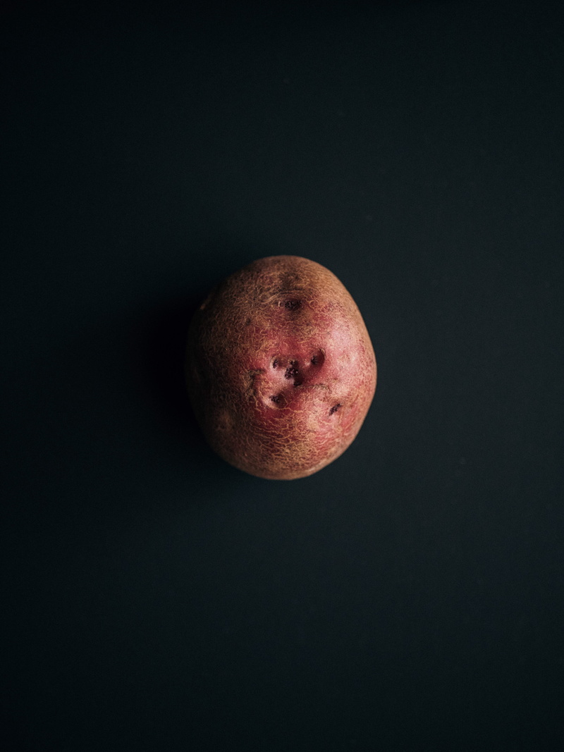minimal, close-up, indoors, raw potato, dark, still life, simple, black background, light, portrait, south laurel, sweet potato, healthy eating, food and drink