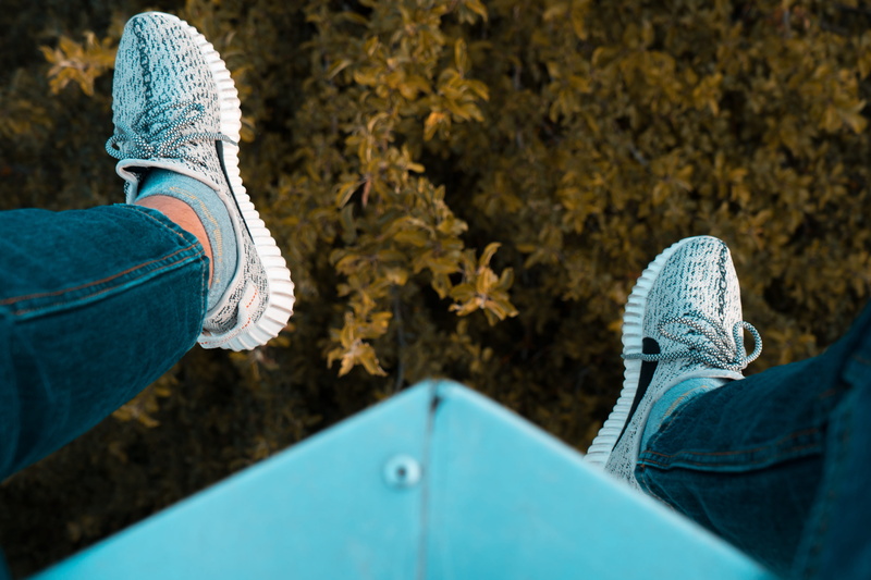 real people, human limb, shoe, human Foot, casual clothing, leisure activity, adidas, sneakers, hanging, On top, people, autumn, sitting, 5K, one Person