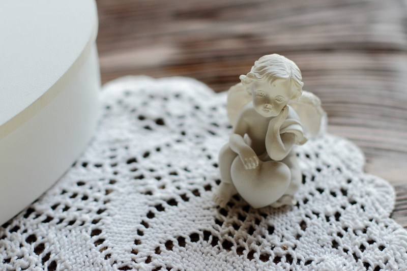 still life, indoors, focus on foreground, high angle view, representation, sculpture, craft, art and craft, needlework, white color, love, traditional