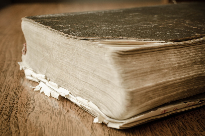 black, Book, Bible, still life, indoors, wood - material, close-up, wealth, used, rustic, worn, table, stack, luxury, brown, publication, surface, selective focus