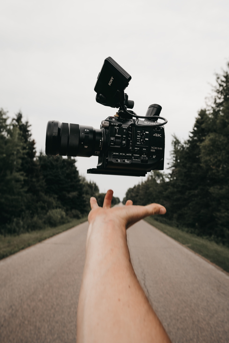 tech, equipment, video camera, hand, one Person, float, nature, levitation, camera, forest, 8K, camera Operator, road, filming, tree, technology, home Video Camera