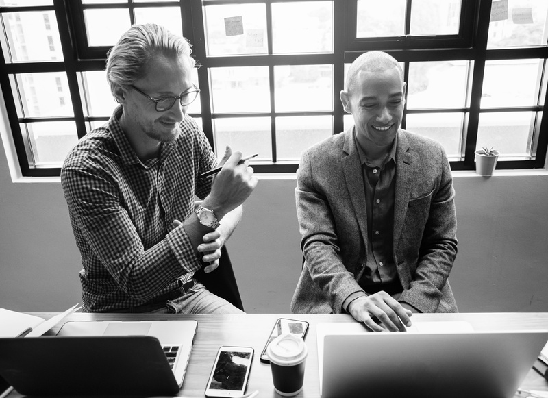 real people, front view, business, computer, table, office, grayscale, casual clothing, technology, entrepreneur, indoors, american, laptop, caucasian