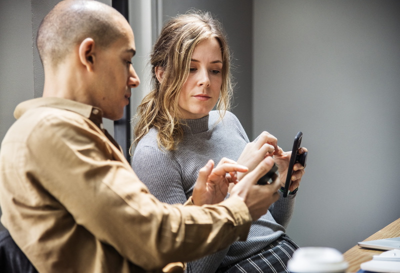 man, hair, device, technology, bald, smart phone, adult, cellphone, sitting, text messaging, holding, indoors, mobile phone, showing, young adult, wireless technology