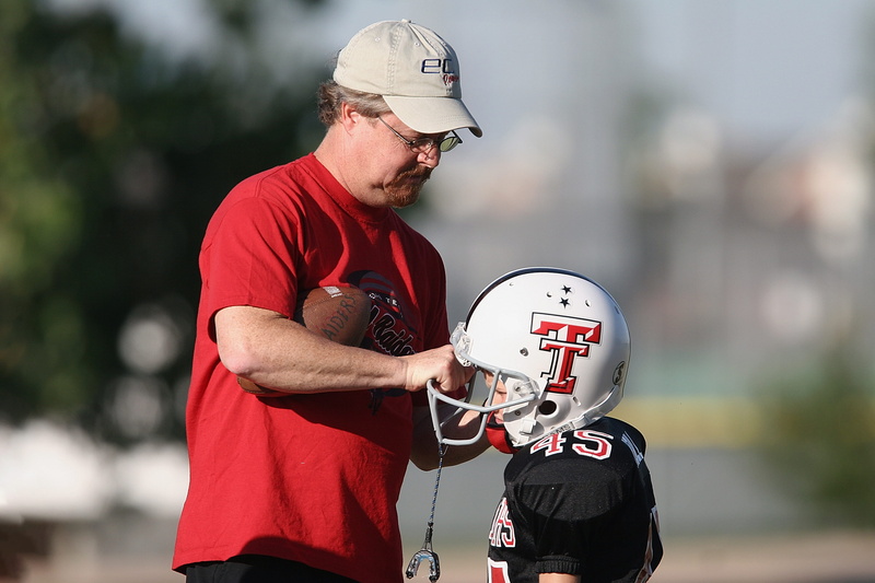 man, wearing, team, youth league, game, focus on foreground, white, helmet, teamwork, 2K, sports equipment, boy, american, coach, male, action, skill