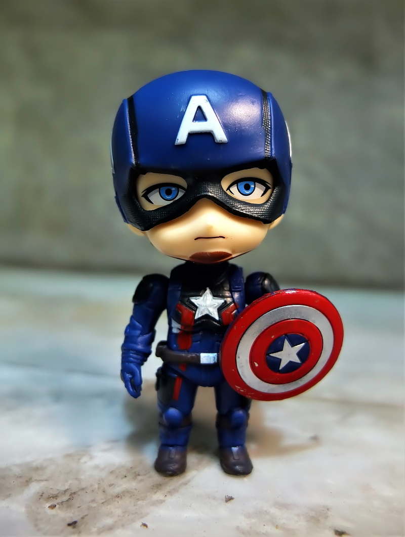 captain, plastic, male likeness, film, character, cute, representation, shield, focus on foreground, star, cartoon, futuristic, close-up, still life, art and craft