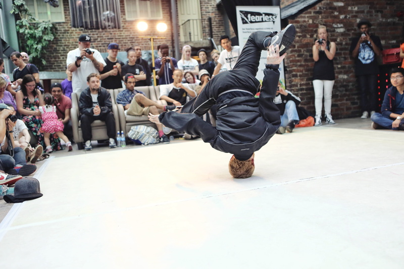 males, dancing, women, city life, battle, community, woman, outdoors, dance, real people, adult, watching, funky, group of people, skill, built structure