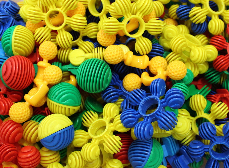 abundance, full frame, no people, pads, children, retail, shape, pattern, backgrounds, childhood, stack, unconcern, fun, indoors, yellow, 2K, joy, studio shot