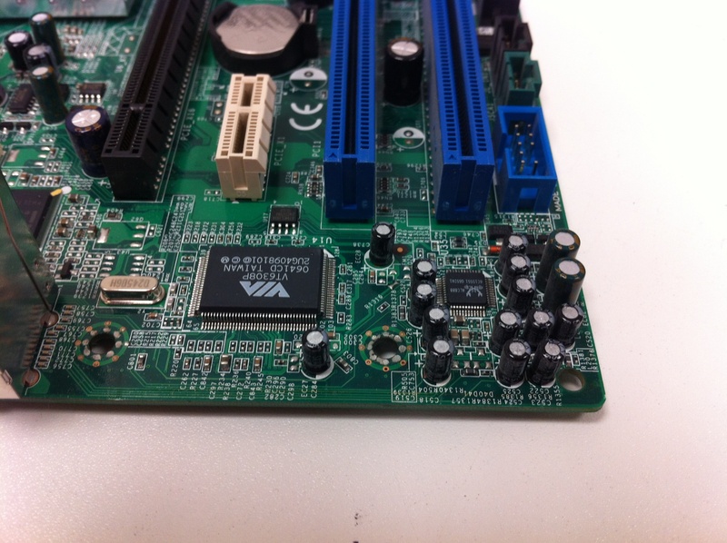 high angle view, electrical Component, still life, chipset, connection, cpu, complexity, motherboard, computer equipment, close-up, green color, macro