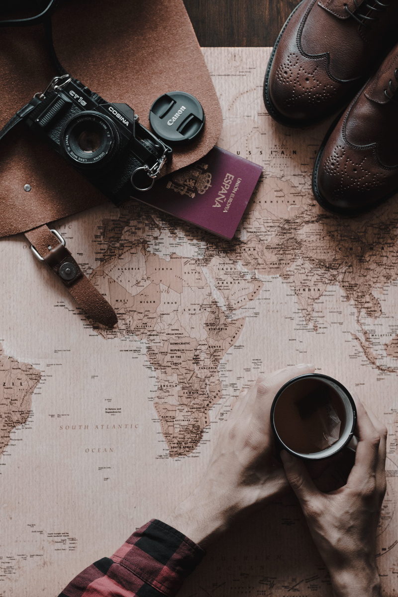 5K, wood - material, flat, one person, document, electronics, coffee, still life, condo, high angle view, cup, photo, bridge, drink, mug, lay, footwear