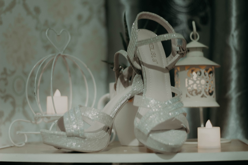 clothing, celebration, no people, shop, crash helmet, indoors, art and craft, sandal, decoration, 5K, close-up, home interior, table, evening dress, accessory