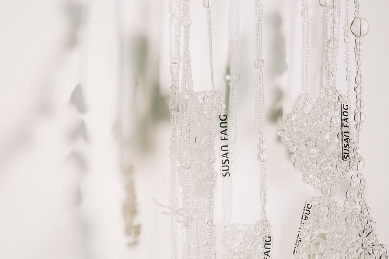 hanging, floral pattern, close-up, vegetable, focus on foreground, mineral, jewelry, fashion, grain, seed, dress, pendant, selective focus, clothing, silver colored