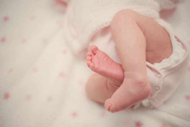 apparel, close-up, madrid, person, human limb, bebé, one person, beginnings, newborn, spain, indoors, toe, finger, sleeping, niña, innocence, sheet, child